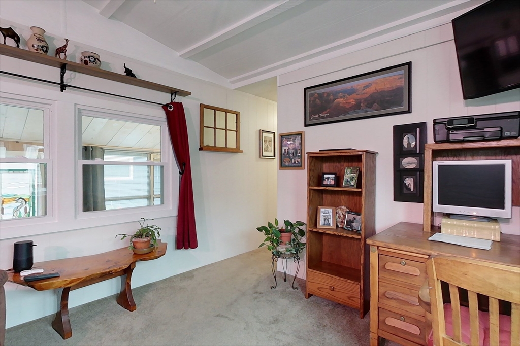 239 Ayer Road, Unit 16 Littleton, MA 01460 - Photo 9 of 22 a workspace with furniture and window