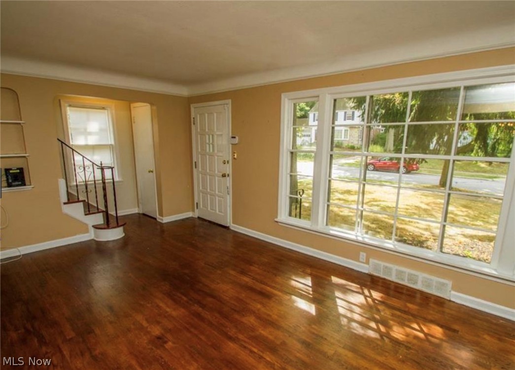 3563 Woodridge Road Cleveland Heights, OH 44121 - Photo 2 of 20 The Living Room with hardwood floor, cove ceiling and plenty of natural incoming light from the large window