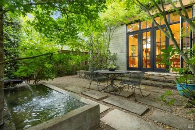 a view of swimming pool with outdoor seating