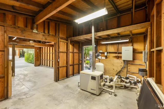a view of a patio with a chairs and table in a patio
