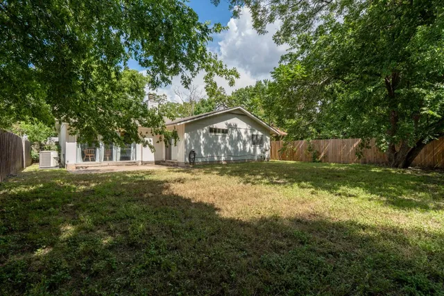 a house view with garden space