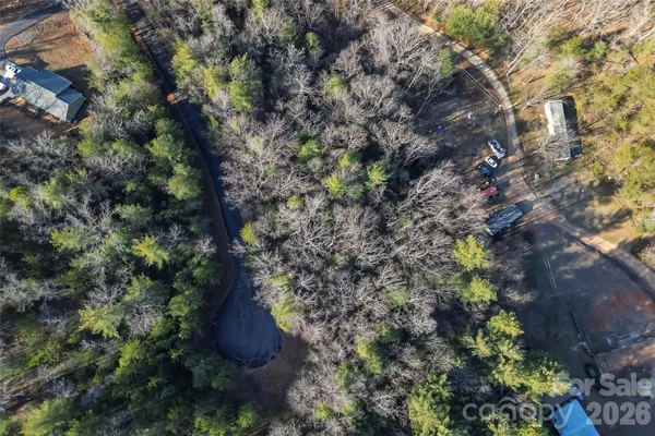a view of a house with a tree