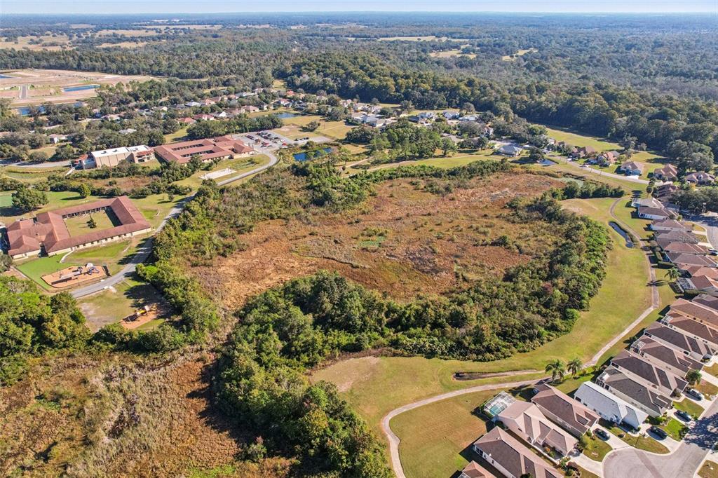 12347 Quail Ridge Drive Spring Hill, FL 34610 - Photo 3 of 20 an aerial view of a house with a yard