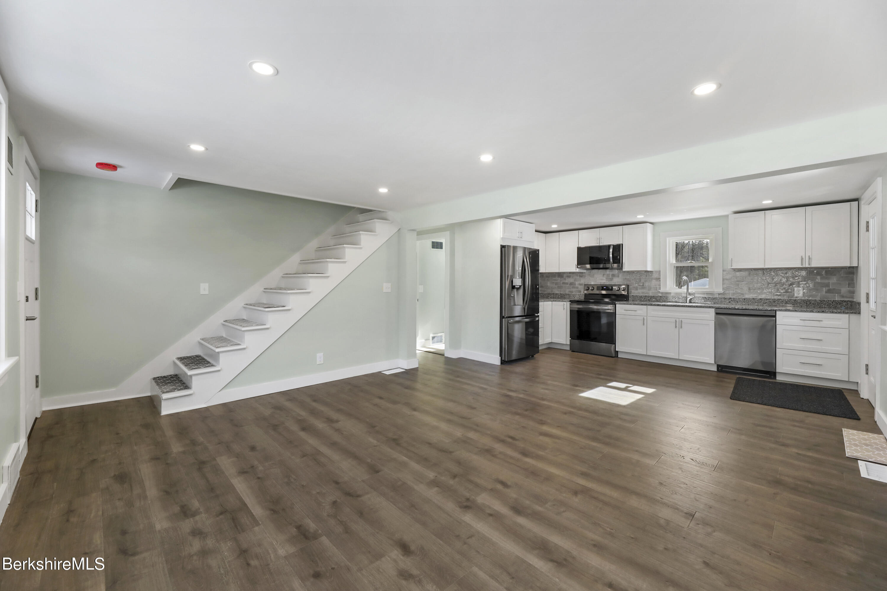 1130 Middle Road Clarksburg, MA 01247 - Photo 11 of 28 a view of a kitchen with a sink stove refrigerator and a window