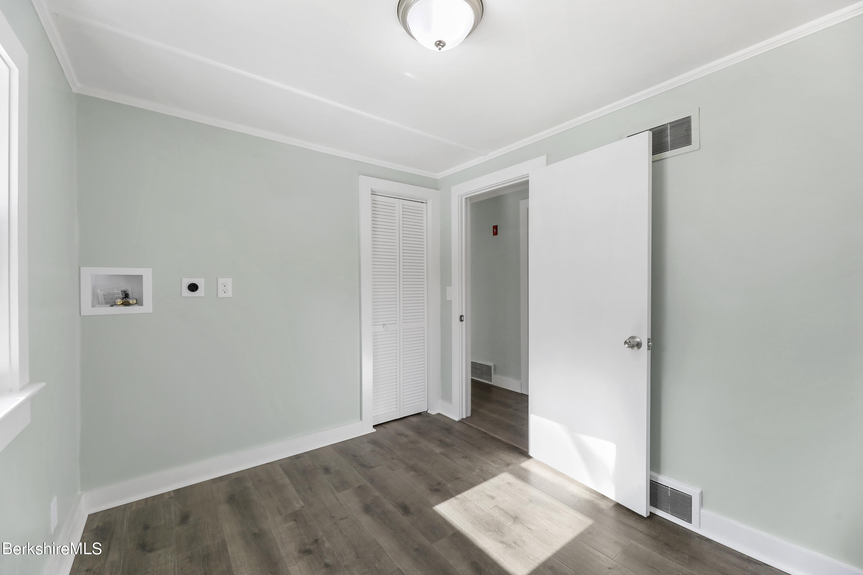 1130 Middle Road Clarksburg, MA 01247 - Photo 20 of 28 an empty room with wooden floor and windows