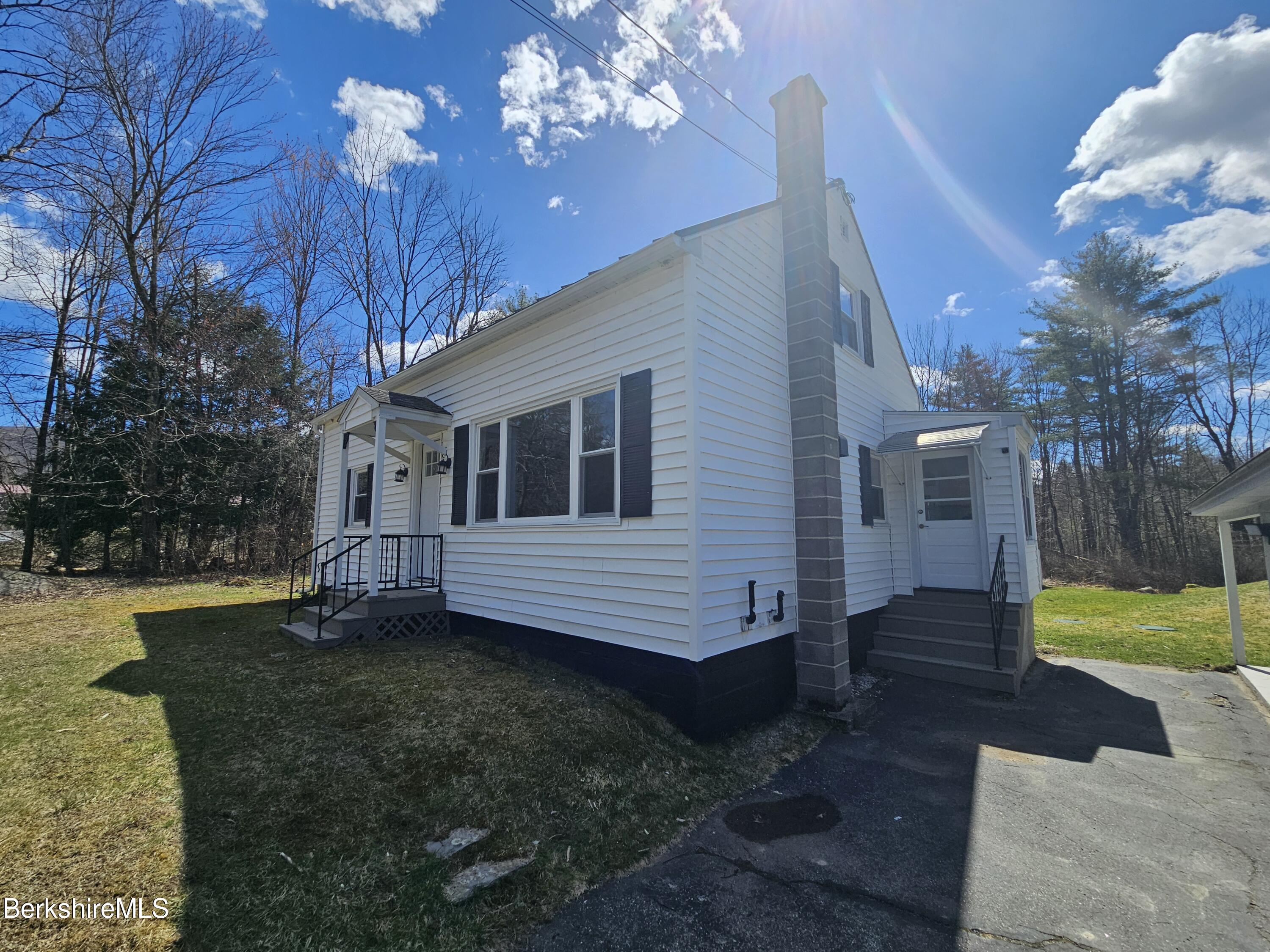1130 Middle Road Clarksburg, MA 01247 - Photo 2 of 28 a view of a house with a yard