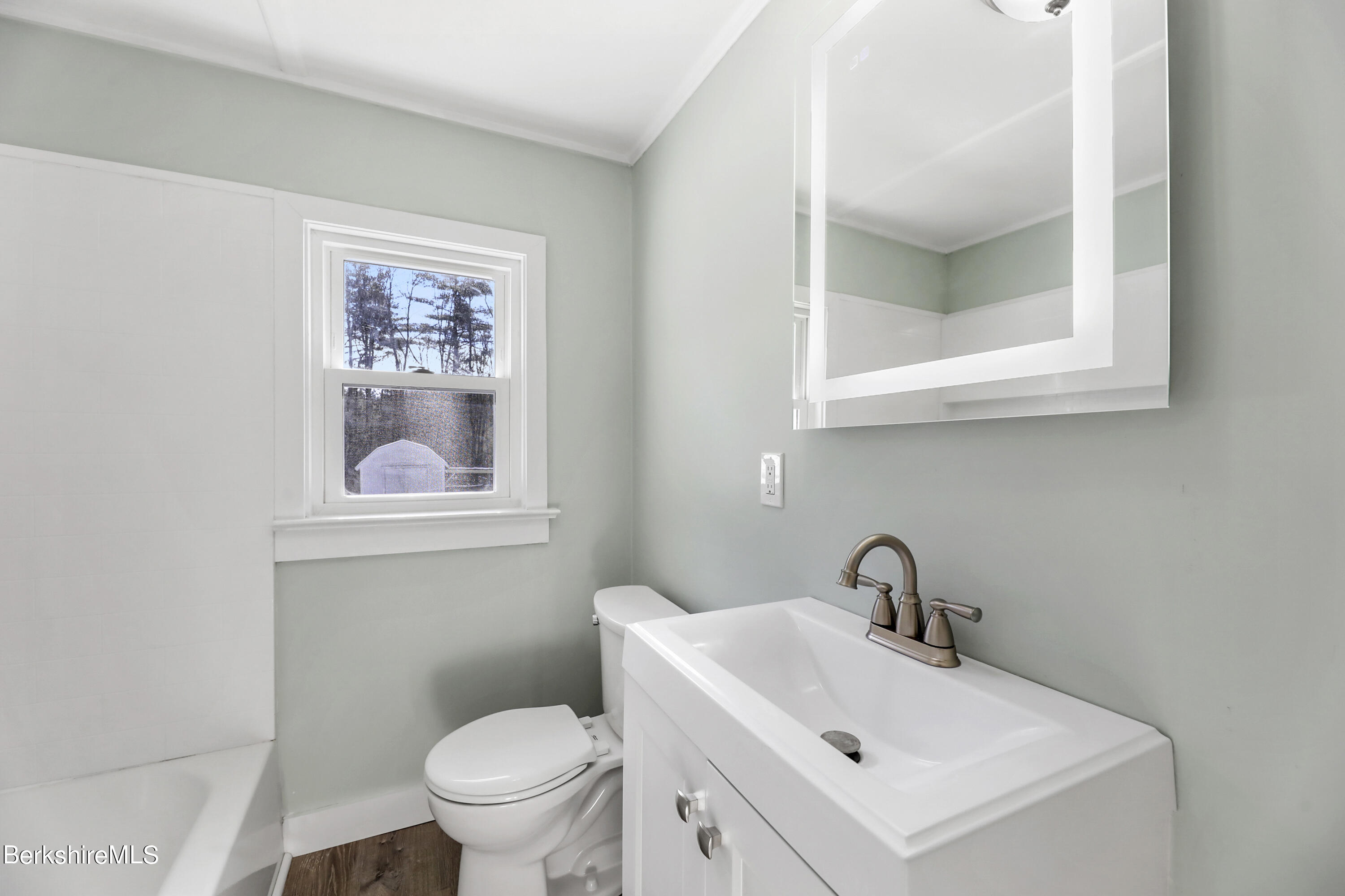 1130 Middle Road Clarksburg, MA 01247 - Photo 21 of 28 a bathroom with a toilet sink and mirror