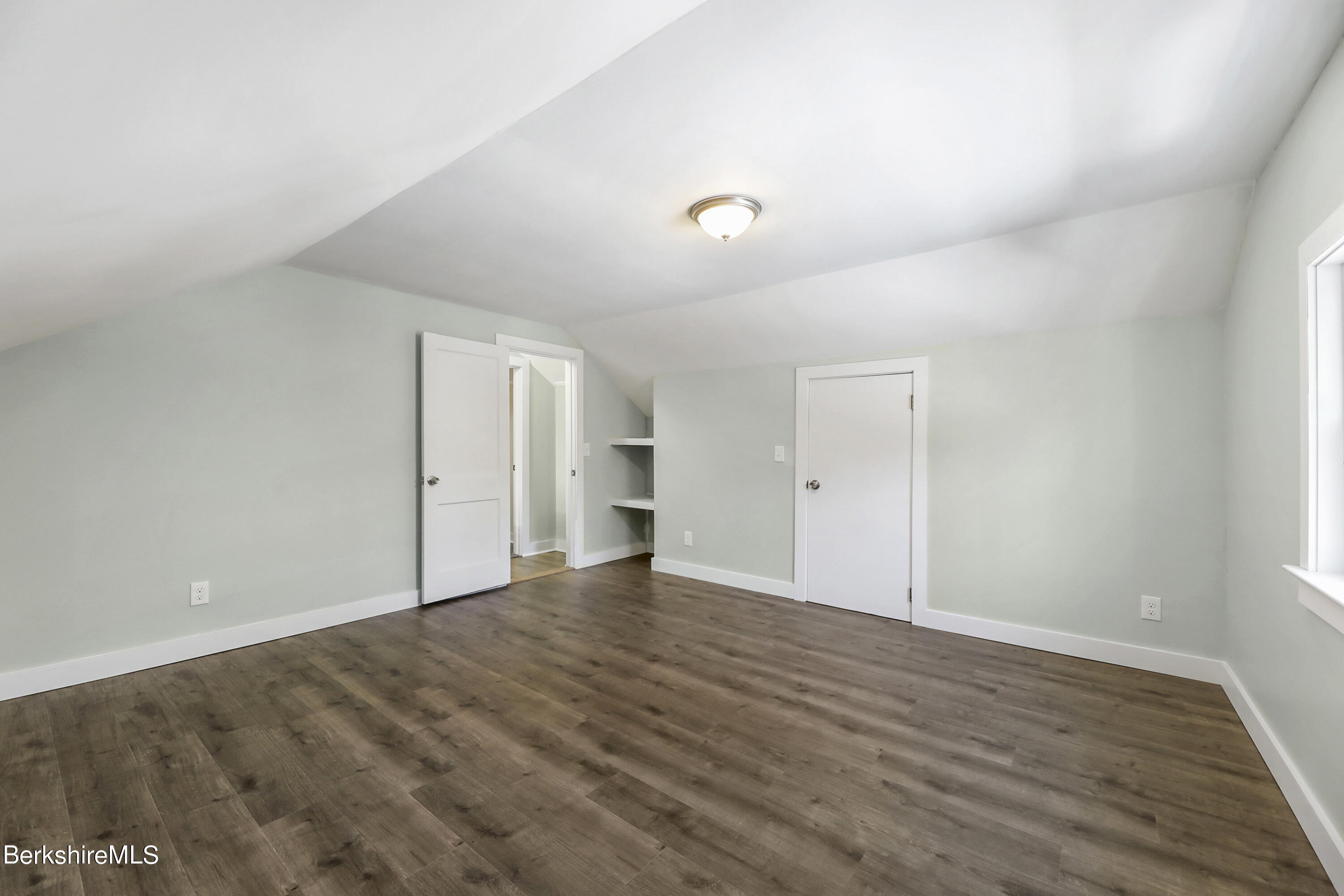 1130 Middle Road Clarksburg, MA 01247 - Photo 23 of 28 a view of an empty room with wooden floor