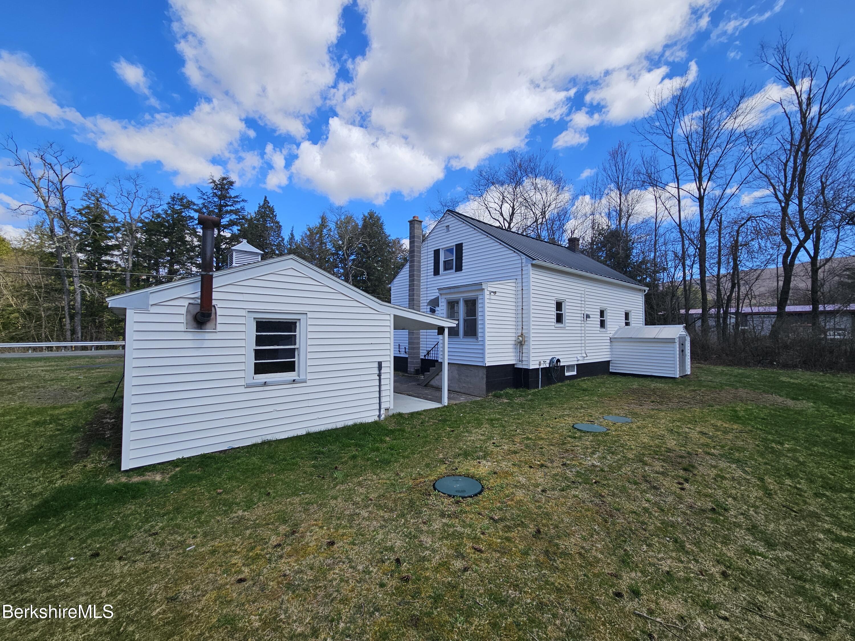 1130 Middle Road Clarksburg, MA 01247 - Photo 4 of 28 a view of a backyard with a garden