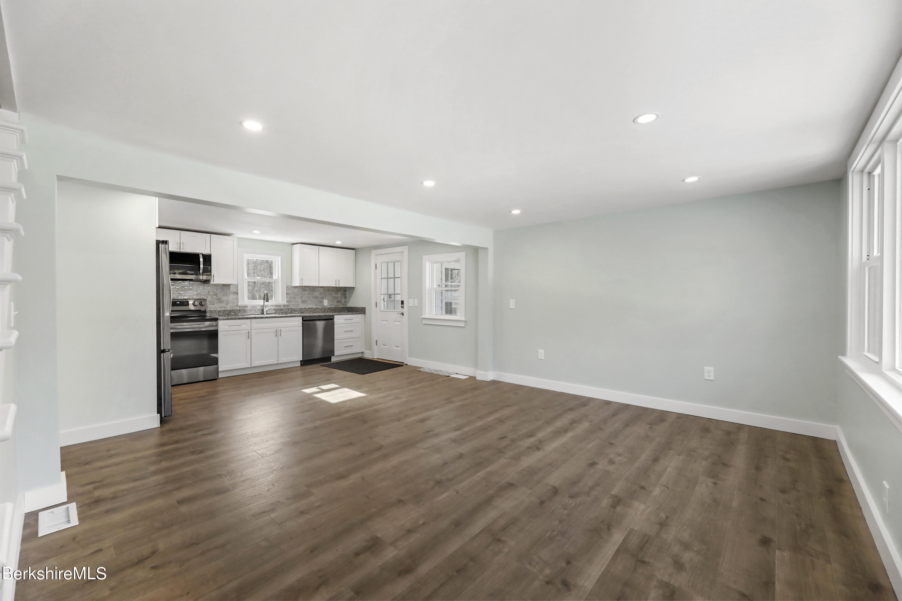 1130 Middle Road Clarksburg, MA 01247 - Photo 10 of 28 a view of kitchen with wooden floor and windows