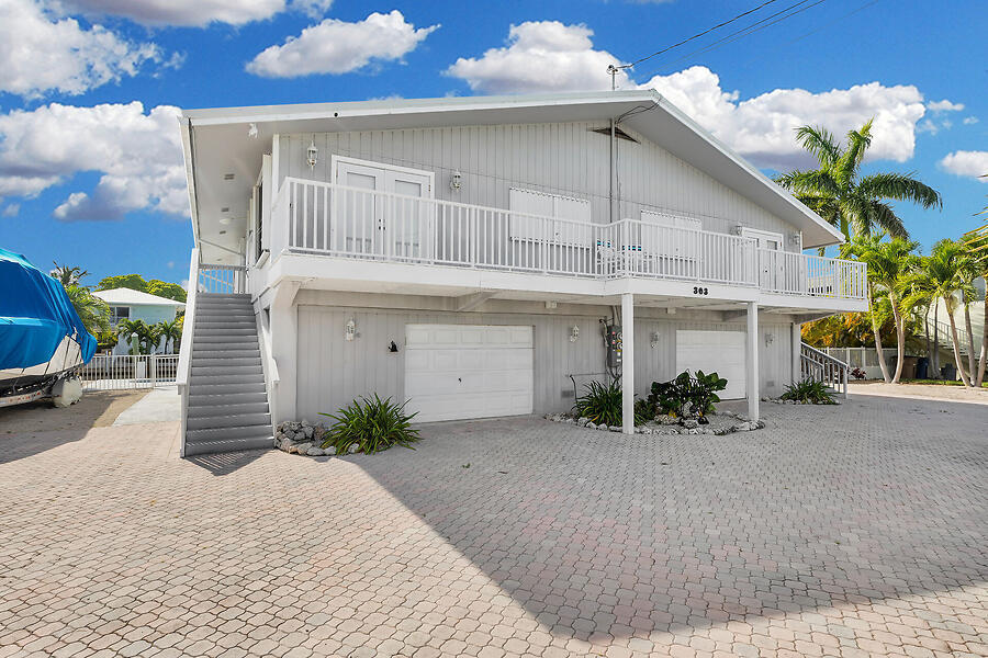 303 Sombrero Beach Road Marathon, FL 33050 - Photo 70 of 84 Front features large paver drive