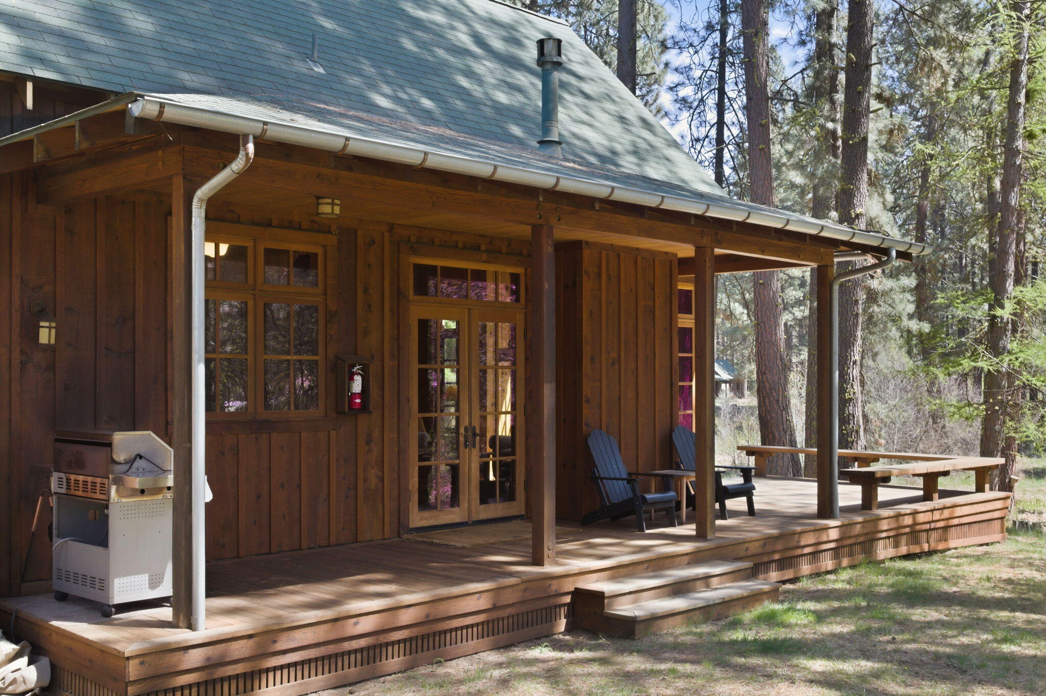 13375 Southwest Forest Service Road, Unit CABIN 18 U1 Camp Sherman, OR 97730 - Photo 20 of 31 a view of a house with sitting area