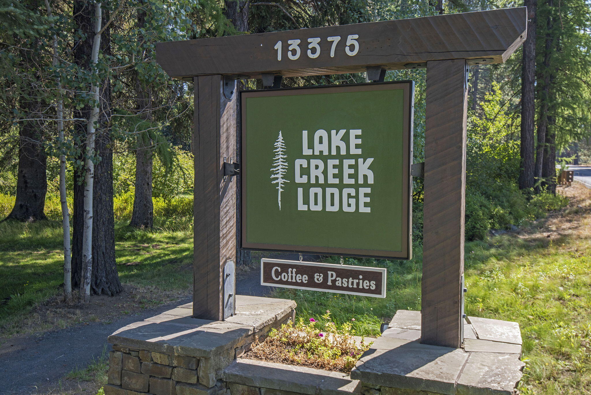13375 Southwest Forest Service Road, Unit CABIN 18 U1 Camp Sherman, OR 97730 - Photo 24 of 31 a sign on the side of the road