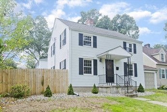 509 Plumtree Road Springfield, MA 01118 - Photo 1 of 34 a front view of a house with garden