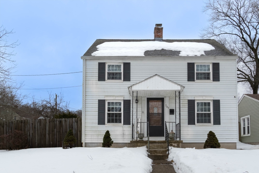 509 Plumtree Road Springfield, MA 01118 - Photo 3 of 34 a front view of a house with a yard