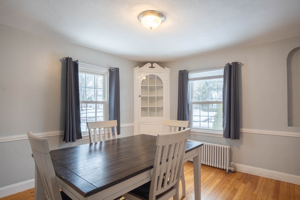 509 Plumtree Road Springfield, MA 01118 - Photo 8 of 34 a view of a dining room with furniture window and wooden floor