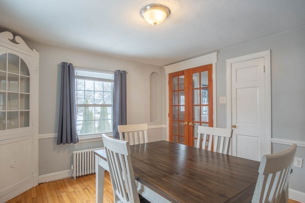 509 Plumtree Road Springfield, MA 01118 - Photo 9 of 34 a view of a dining room with furniture window and wooden floor