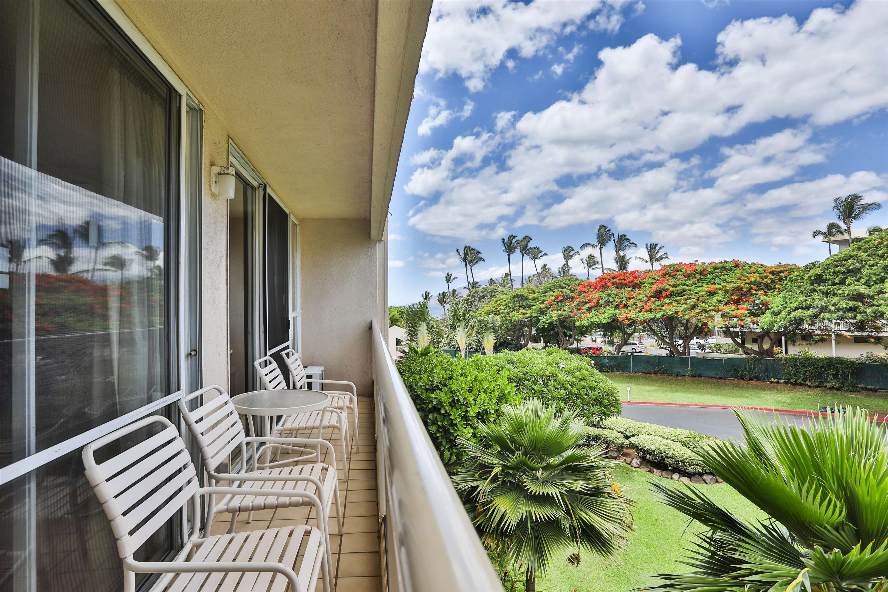 2575 South Kihei Road, Unit G306 Kihei, HI 96753 - Photo 16 of 18 a balcony with chairs and lake view