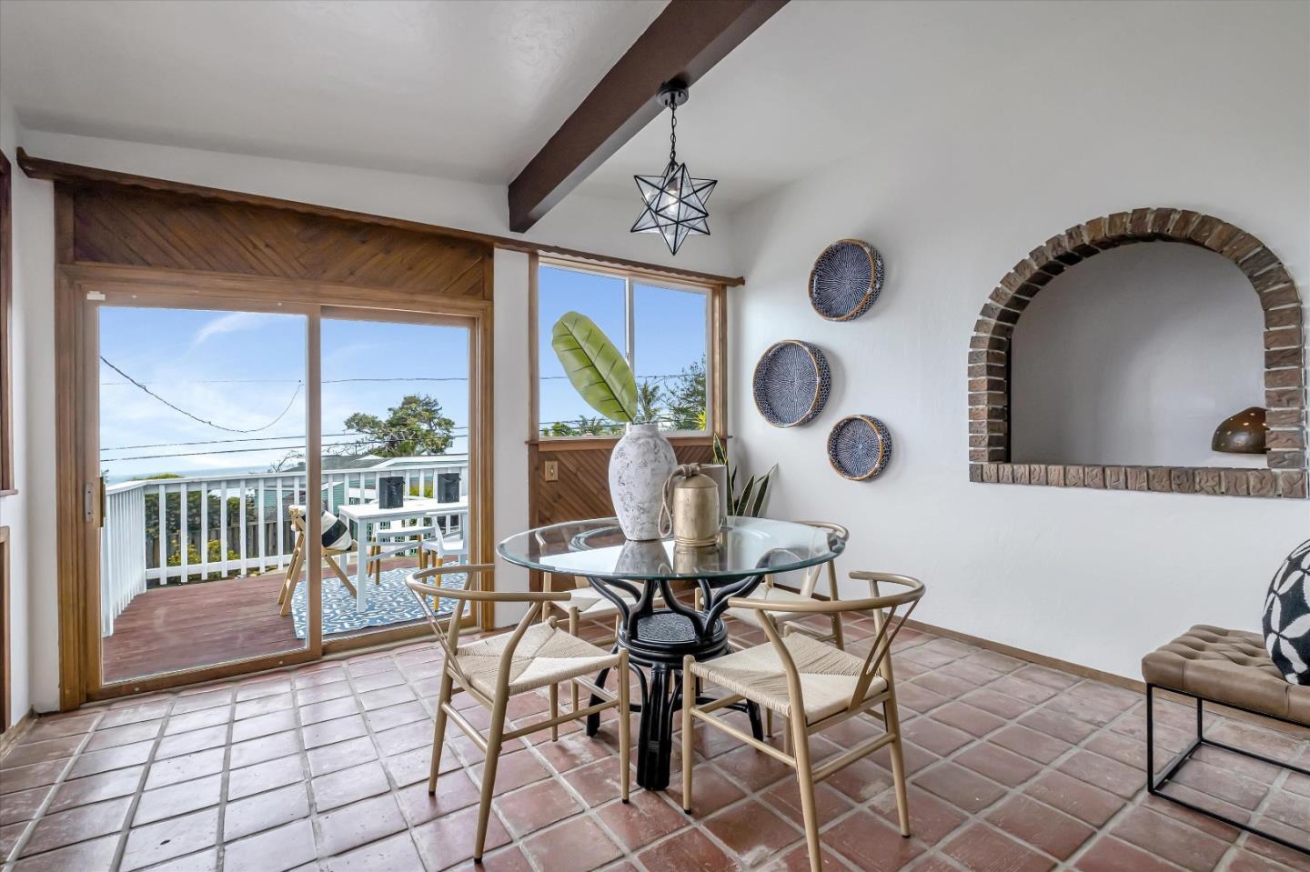 722 Seacliff Drive Aptos, CA 95003 - Photo 13 of 51 a view of a dining room with furniture and floor to ceiling window