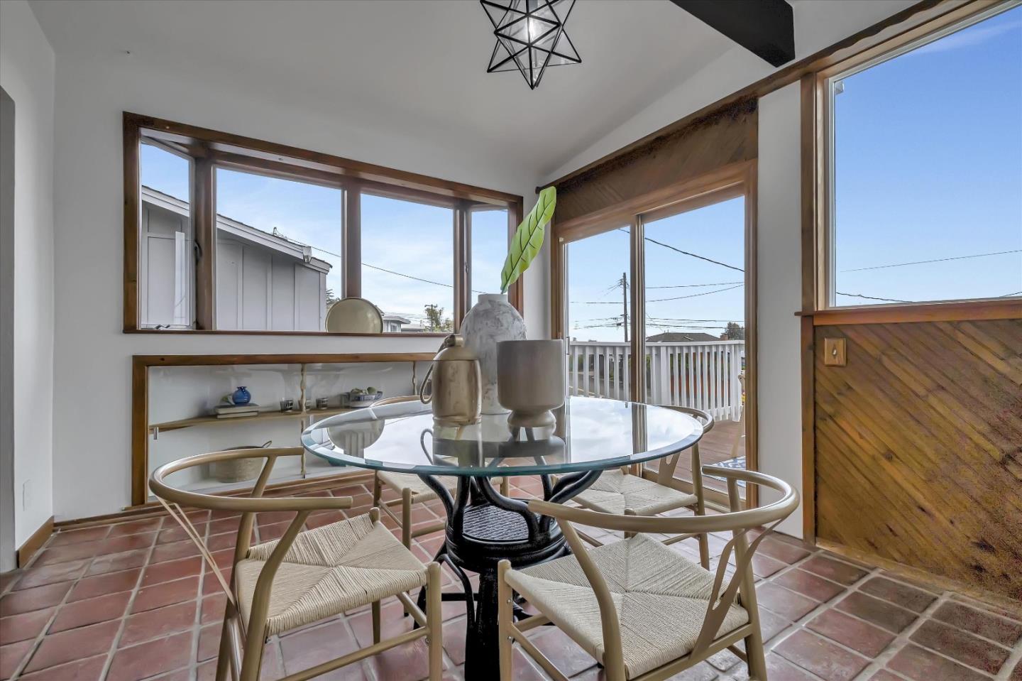 722 Seacliff Drive Aptos, CA 95003 - Photo 14 of 51 a view of a dining room with furniture window and outside view