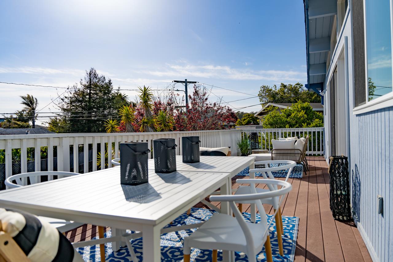 722 Seacliff Drive Aptos, CA 95003 - Photo 16 of 51 a view of a dinning tables and chairs on the roof deck