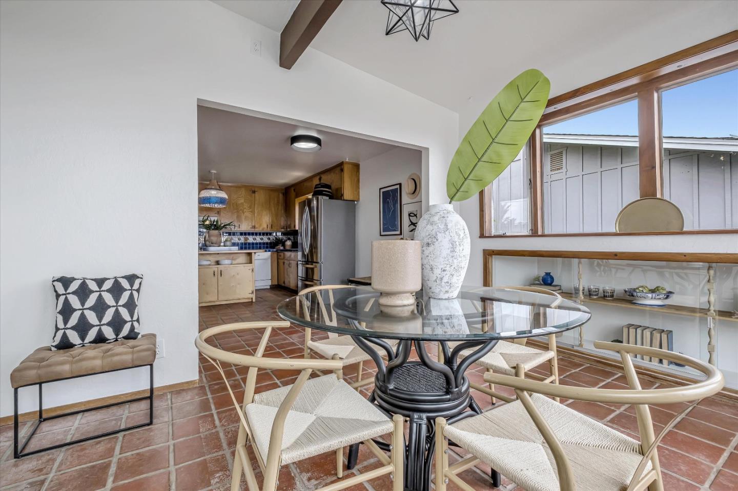 722 Seacliff Drive Aptos, CA 95003 - Photo 18 of 51 a kitchen with a dining table and chairs
