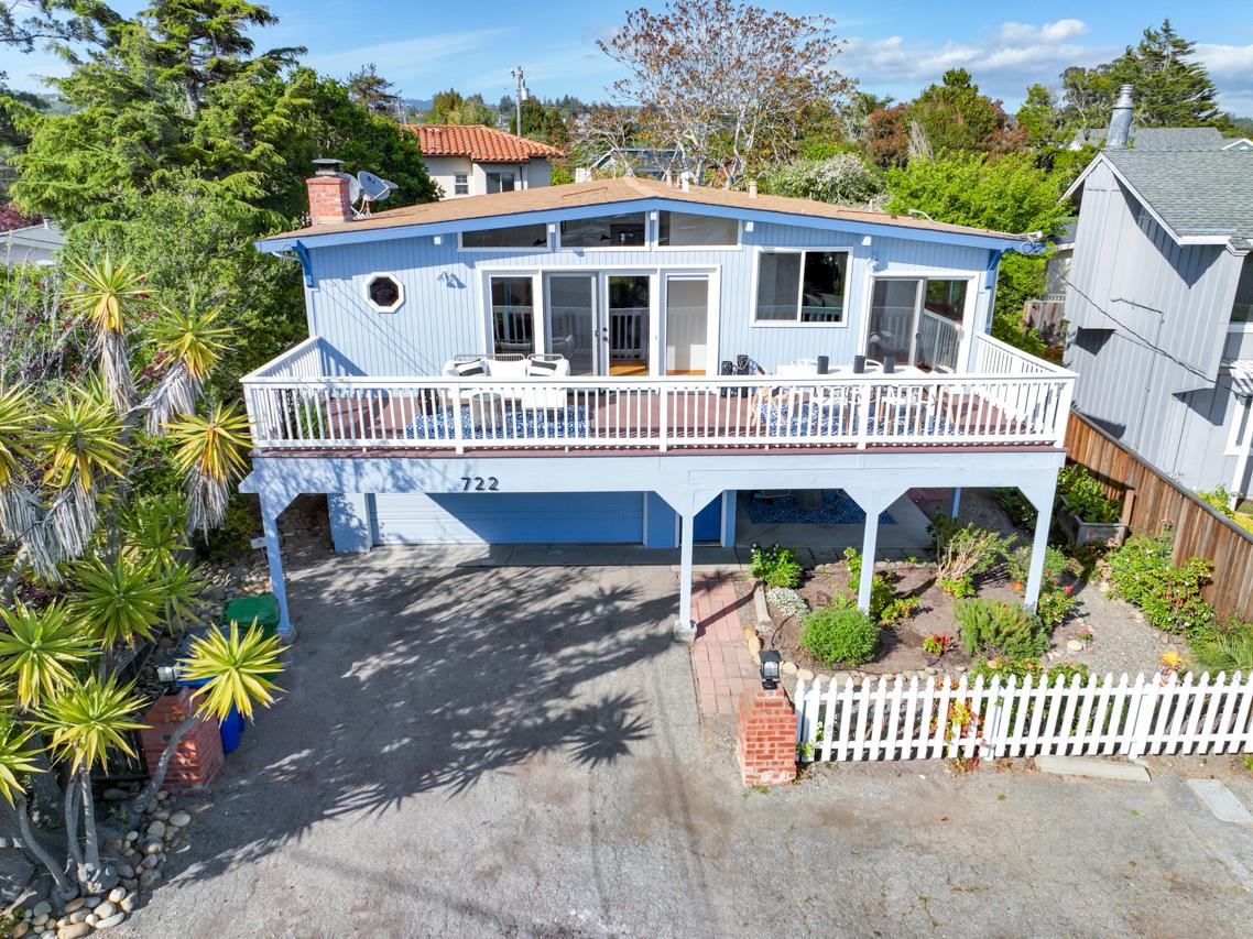 722 Seacliff Drive Aptos, CA 95003 - Photo 3 of 51 a front view of a house with a porch and furniture