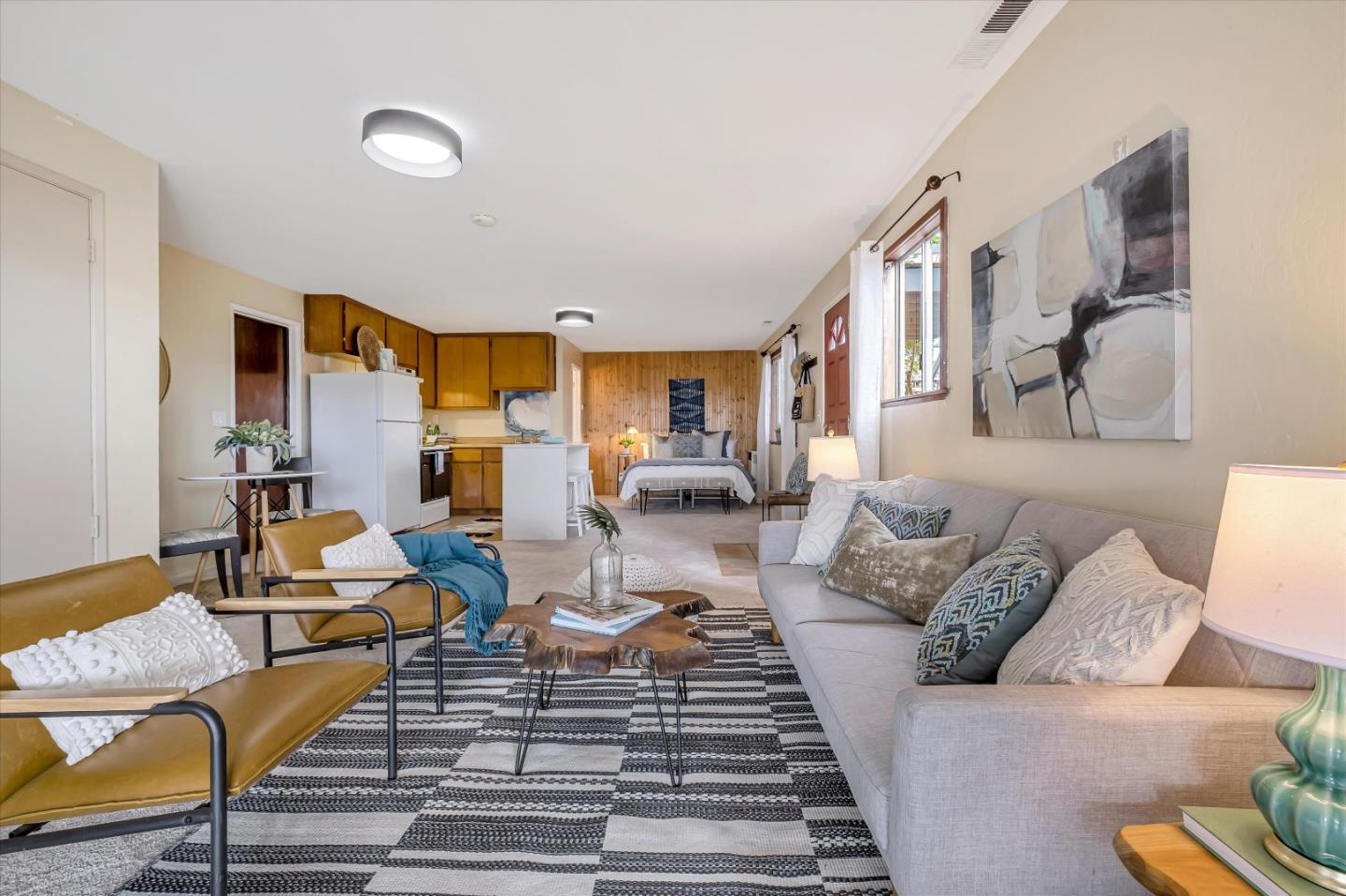 722 Seacliff Drive Aptos, CA 95003 - Photo 36 of 51 a living room with furniture fireplace and a table