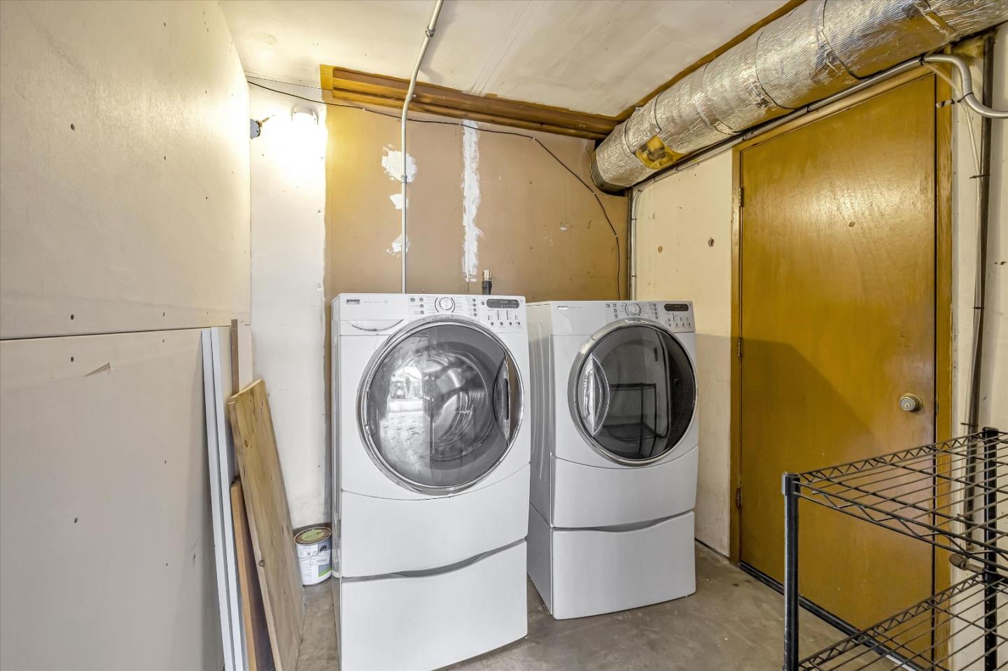 722 Seacliff Drive Aptos, CA 95003 - Photo 47 of 51 a utility room with dryer and washer