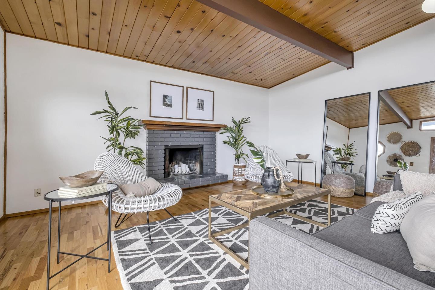 722 Seacliff Drive Aptos, CA 95003 - Photo 8 of 51 a living room with furniture and a fireplace