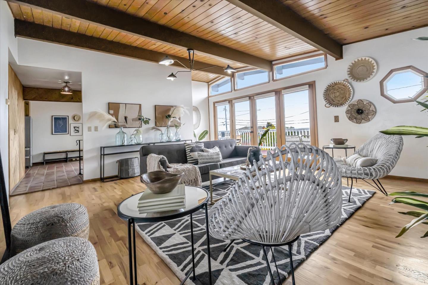 722 Seacliff Drive Aptos, CA 95003 - Photo 9 of 51 a living room with furniture and a large window
