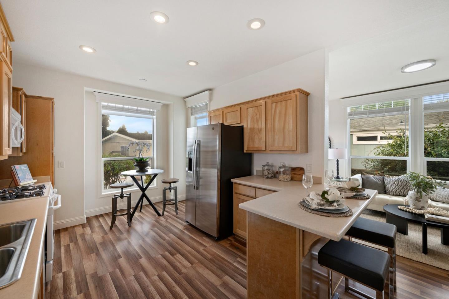 6130 Monterey Road, Unit 189 San Jose, CA 95138 - Photo 14 of 42 a view of a dining room with furniture window and wooden floor