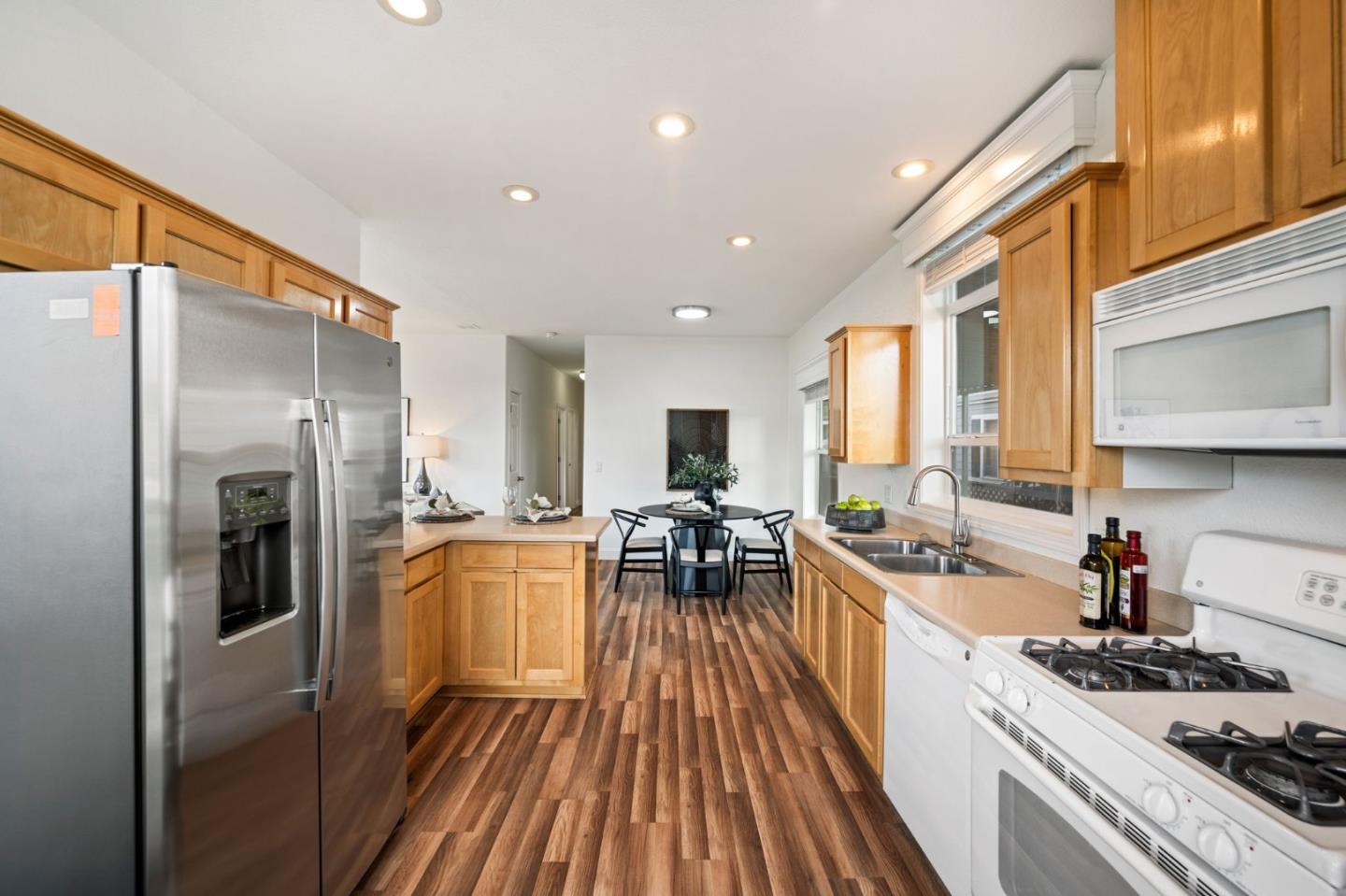 6130 Monterey Road, Unit 189 San Jose, CA 95138 - Photo 17 of 42 a kitchen with sink a stove and refrigerator