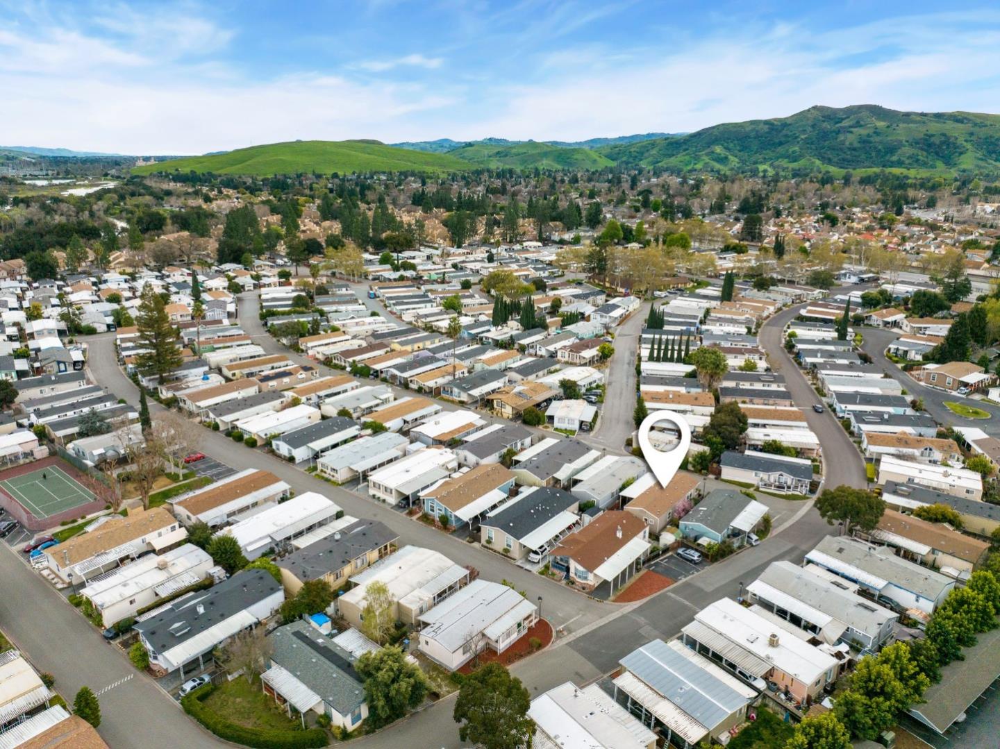 6130 Monterey Road, Unit 189 San Jose, CA 95138 - Photo 36 of 42 an aerial view of residential houses with outdoor space