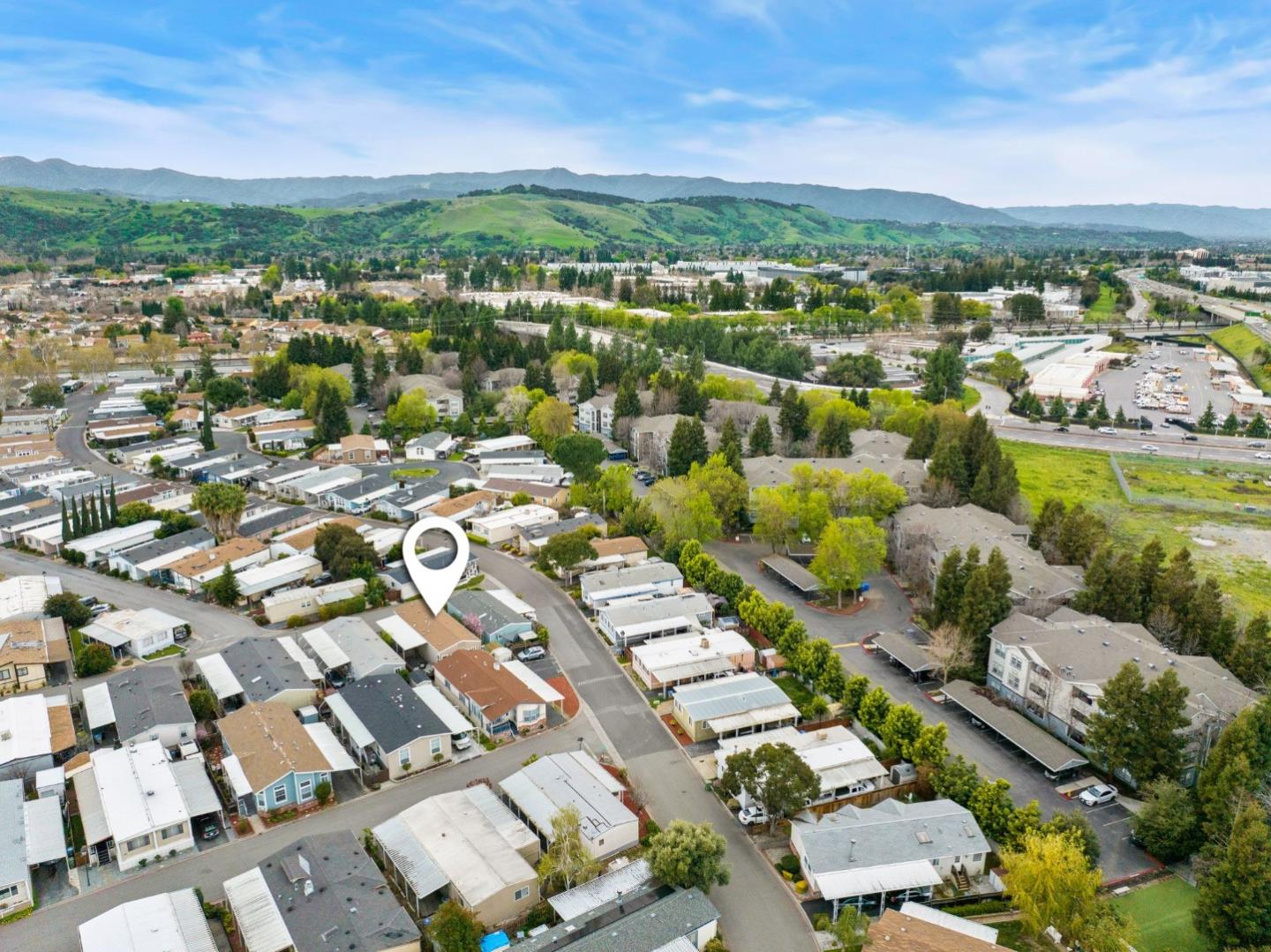 6130 Monterey Road, Unit 189 San Jose, CA 95138 - Photo 37 of 42 an aerial view of residential houses with outdoor space