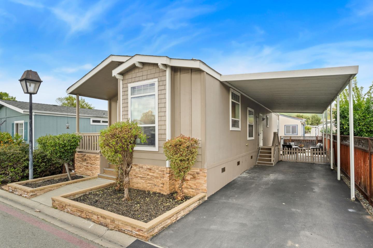 6130 Monterey Road, Unit 189 San Jose, CA 95138 - Photo 4 of 42 a front view of a house with garden