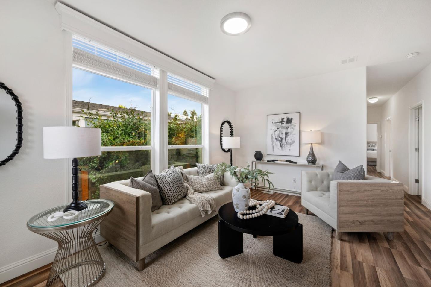 6130 Monterey Road, Unit 189 San Jose, CA 95138 - Photo 7 of 42 a living room with furniture and a large window