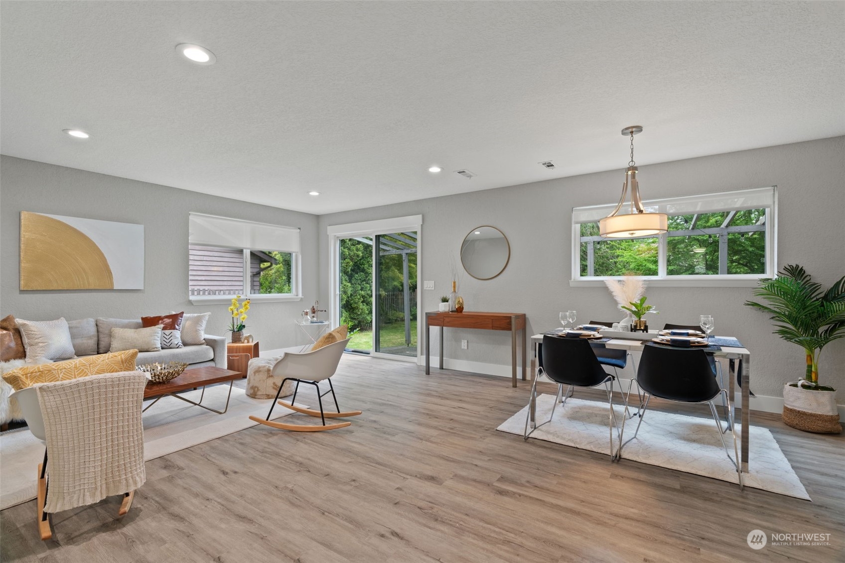 22417 18th Avenue Southeast Bothell, WA 98021 - Photo 3 of 25 a living room with furniture a window and gym equipment