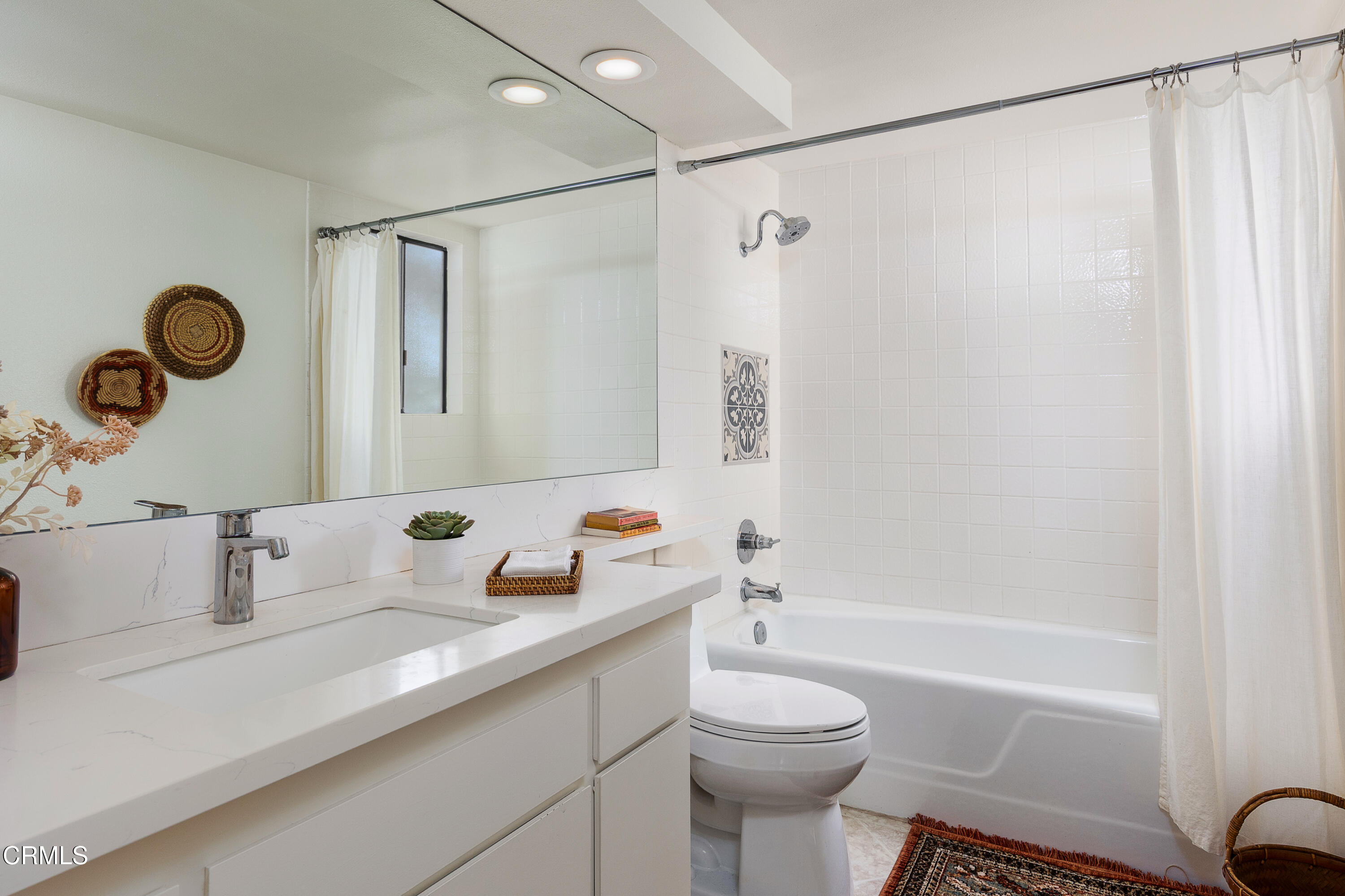 1868 Kaweah Drive Pasadena, CA 91105 - Photo 19 of 28 a bathroom with a sink mirror toilet and shower