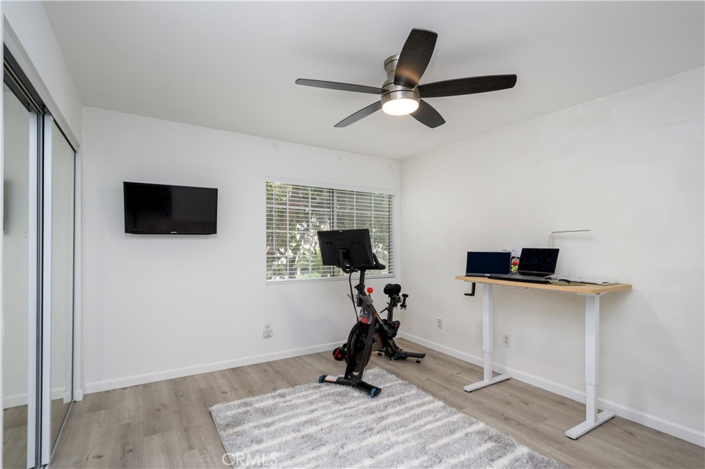 628 Daisy Avenue, Unit 222 Long Beach, CA 90802 - Photo 15 of 25 a view of workspace with wooden floor and windows