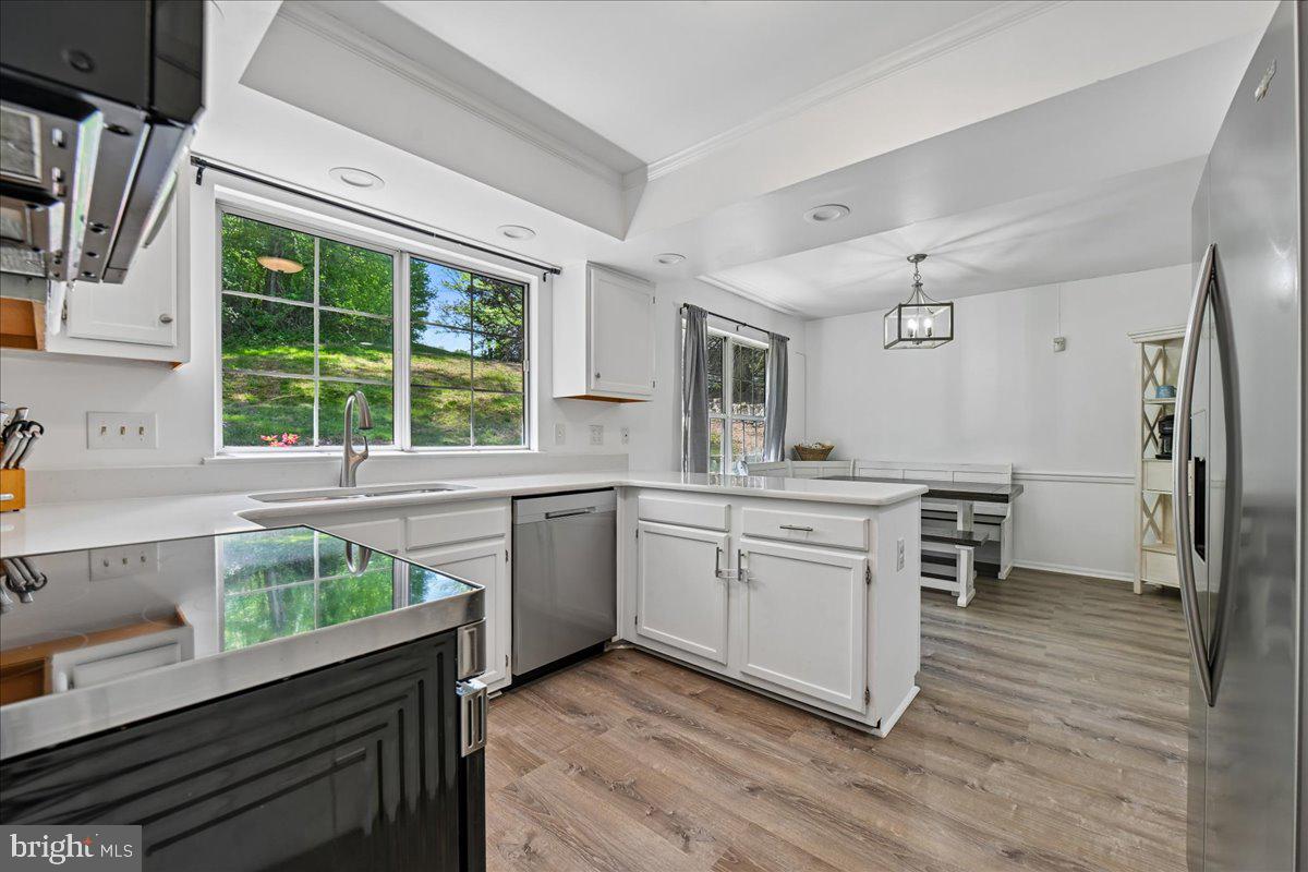 903 Brook Street Accokeek, MD 20607 - Photo 14 of 57 Bright Kitchen with Quartz Counters & LVP