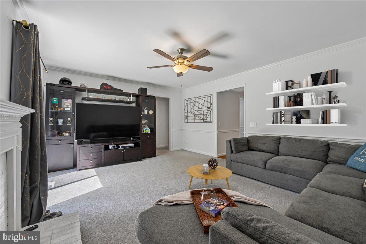 903 Brook Street Accokeek, MD 20607 - Photo 19 of 57 Family Room with Fireplace & Backyard Access
