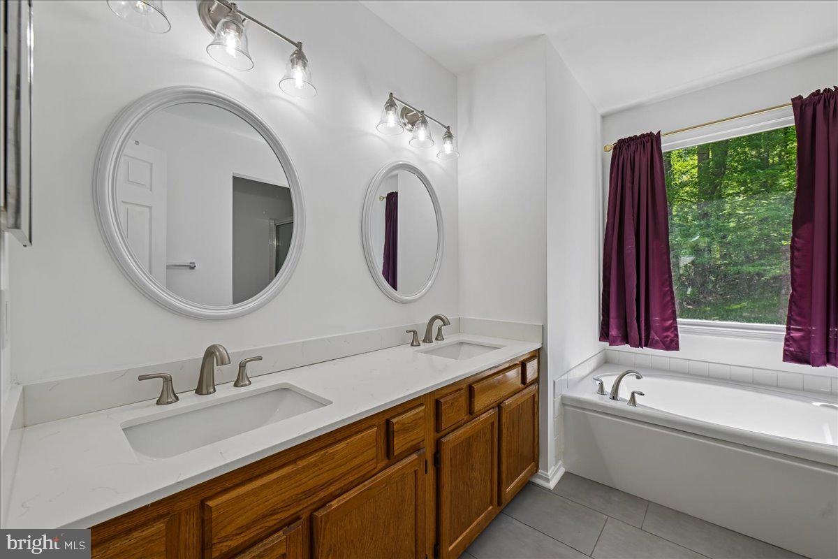 903 Brook Street Accokeek, MD 20607 - Photo 31 of 57 Spacious Primary Bath with Separate Shower