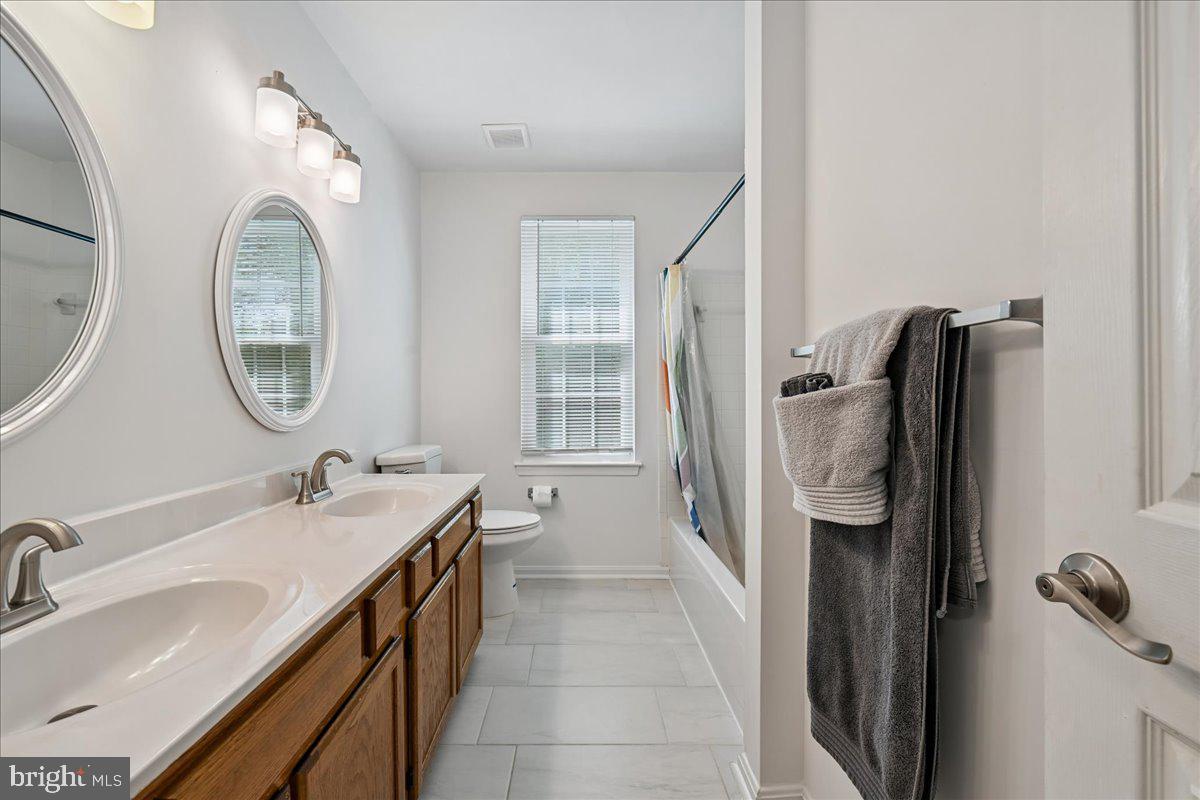 903 Brook Street Accokeek, MD 20607 - Photo 35 of 57 Hall Bathroom with Double Vanity