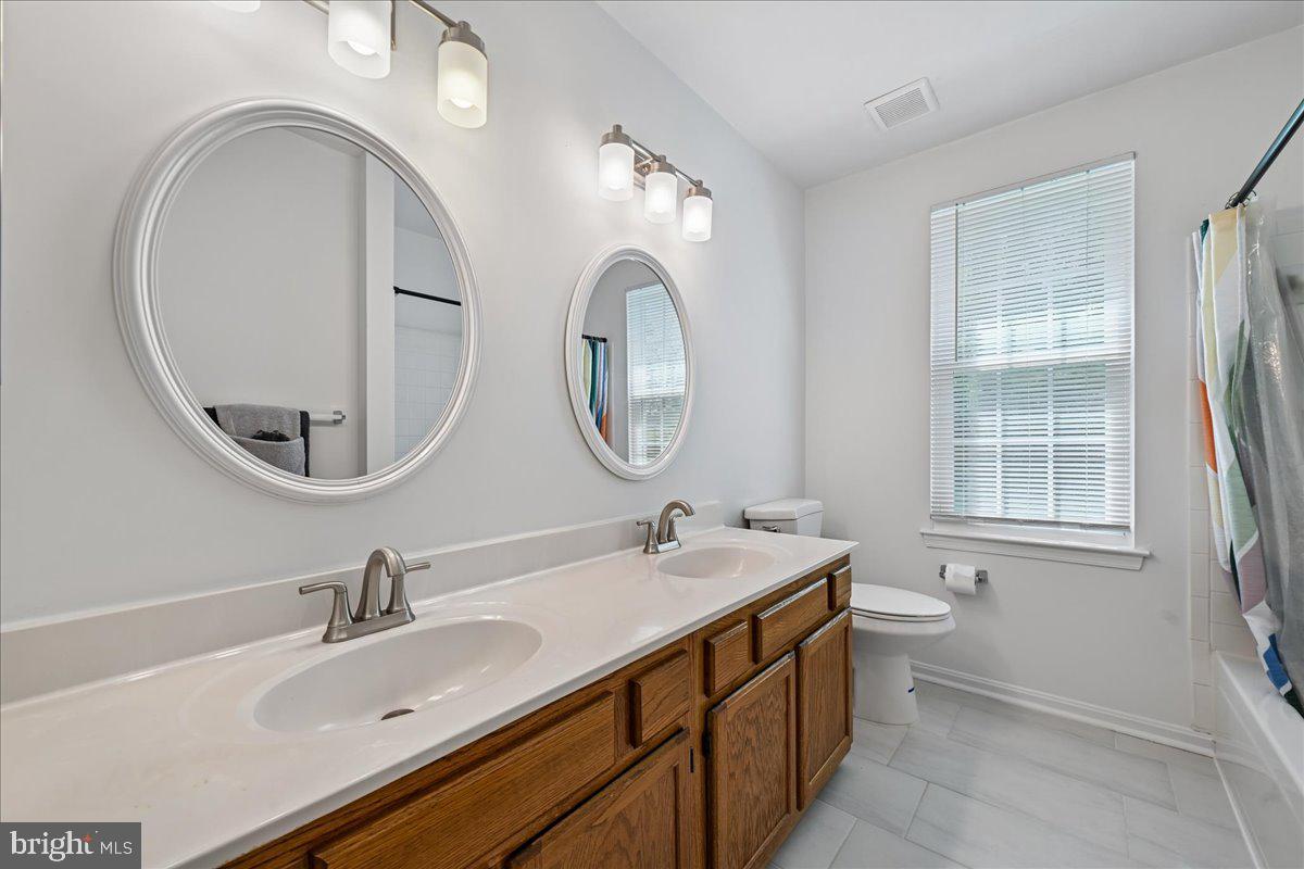 903 Brook Street Accokeek, MD 20607 - Photo 36 of 57 Hallway Double Vanity Bathroom