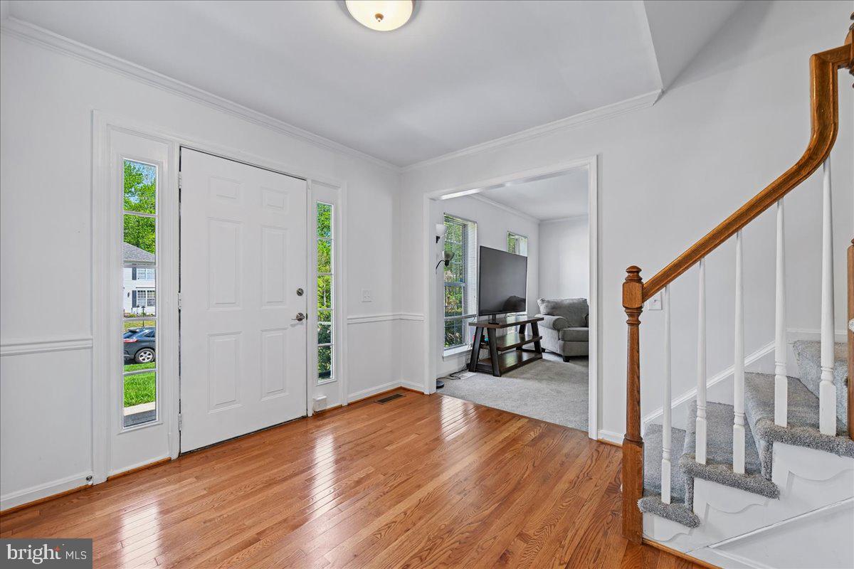 903 Brook Street Accokeek, MD 20607 - Photo 7 of 57 Welcoming Foyer with Hardwood Floors