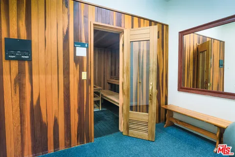 a view of a swimming pool with an outdoor seating