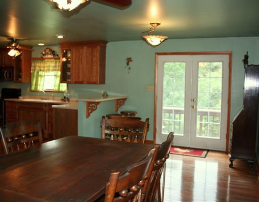 194 Noonen Street Rochester, PA 15074 - Photo 4 of 18 Dining Room. Here you see part of the large dining room; a great combination! The French doors open to a wrap-around deck...this house has great flow