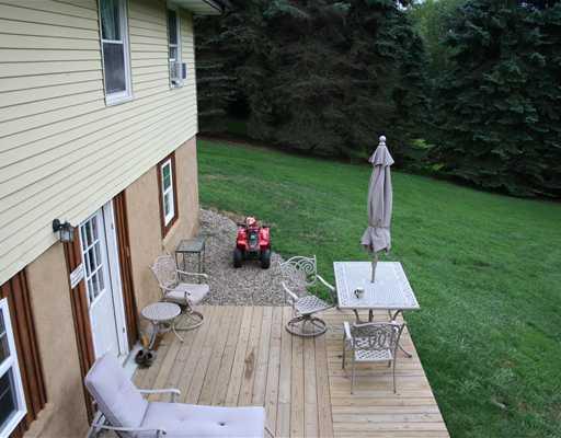 194 Noonen Street Rochester, PA 15074 - Photo 7 of 18 Exterior Back. This 2nd deck is off the finished, walkout lower level.