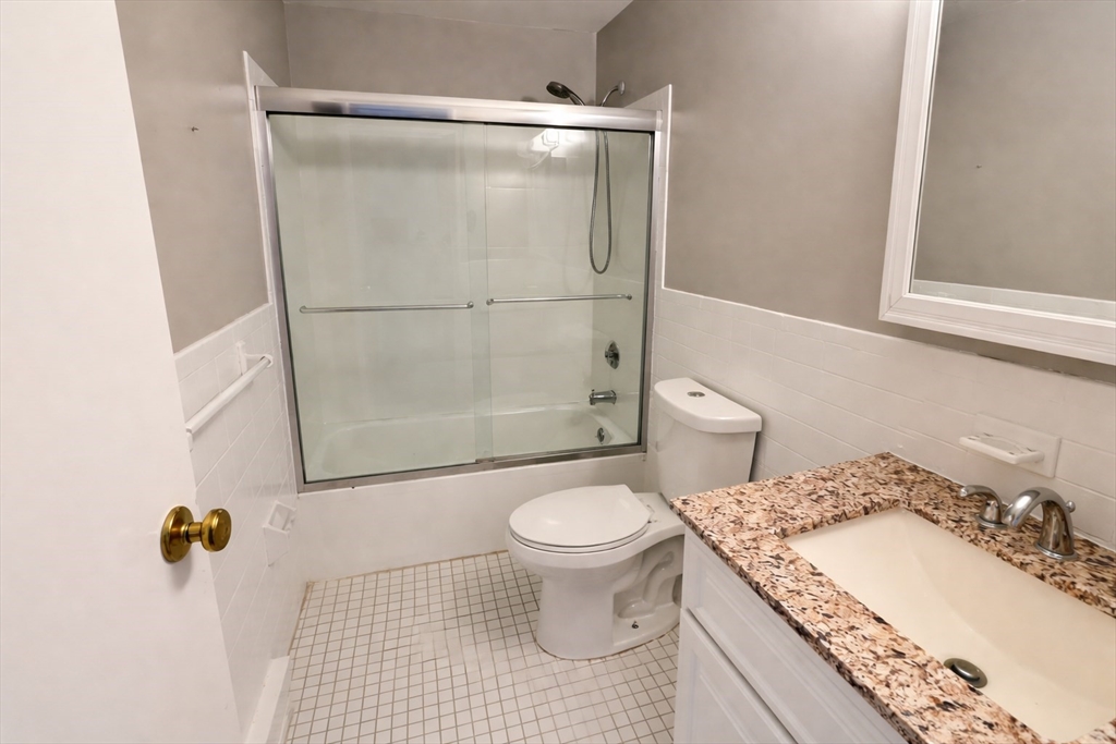 15 Weld Street, Unit 18 Framingham, MA 01702 - Photo 13 of 18 a bathroom with a sink toilet and shower